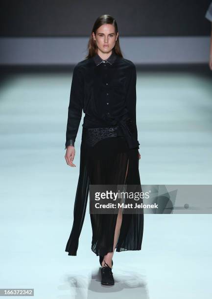 Model showcases designs by The Letter Q on the runway at the New Generation show during Mercedes-Benz Fashion Week Australia Spring/Summer 2013/14 at...