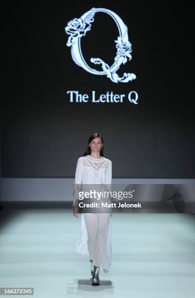 Model showcases designs by The Letter Q on the runway at the New Generation show during Mercedes-Benz Fashion Week Australia Spring/Summer 2013/14 at...