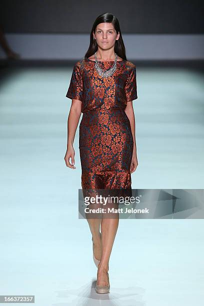 Model showcases designs by Betty Tran on the runway at the New Generation show during Mercedes-Benz Fashion Week Australia Spring/Summer 2013/14 at...