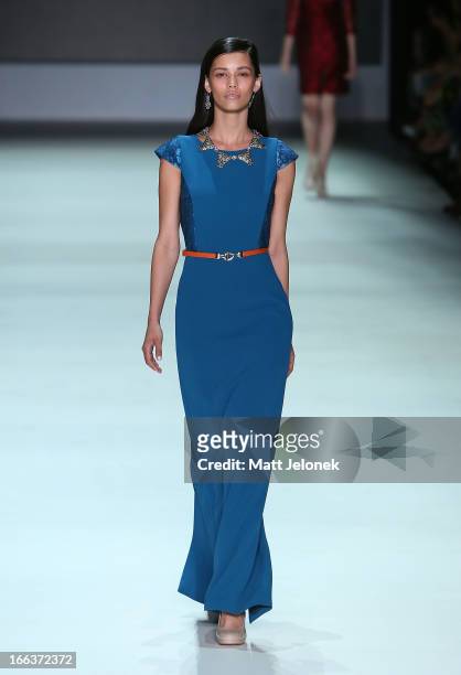 Model showcases designs by Betty Tran on the runway at the New Generation show during Mercedes-Benz Fashion Week Australia Spring/Summer 2013/14 at...