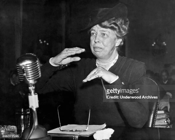 Eleanor Roosevelt as she appeared before a committee investigating civilian defense, Washington DC, 1942. She is the assistant director of the Office...
