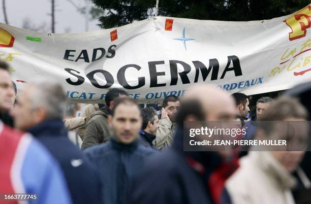 European Aeronautics EADS-Sogerma's employees partially block the entrance of the Merignac EADS-Sogerma factory, south-west France, to denounce the...