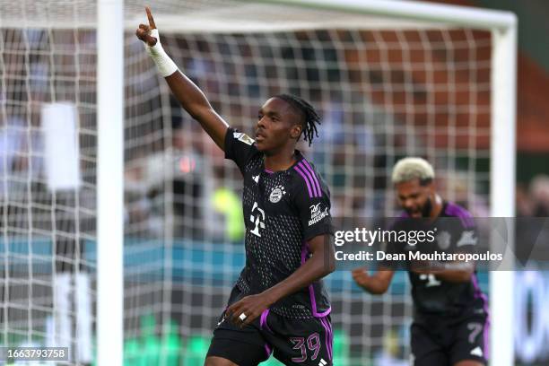 Mathys Tel of Bayern Munich celebrates after scoring the team's second goal during the Bundesliga match between Borussia Mönchengladbach and FC...