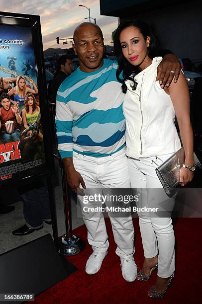 Actor Mike Tyson and Kiki Tyson arrive for the premiere of Dimension Films' "Scary Movie 5" at ArcLight Cinemas Cinerama Dome on April 11, 2013 in...