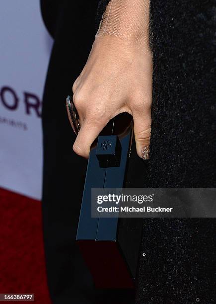 Actress Ashley Tisdale arrives for the premiere of Dimension Films' "Scary Movie 5" at ArcLight Cinemas Cinerama Dome on April 11, 2013 in Hollywood,...