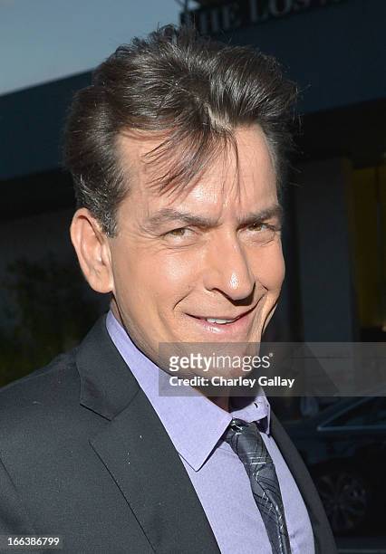 Actor Charlie Sheen arrives at the premiere of "Scary Movie V" presented by Dimension Films, in partnership with Lexus and Chambord at the Cinerama...