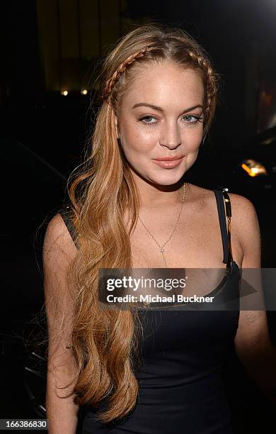 Actress Lindsay Lohan arrives for the premiere of Dimension Films' "Scary Movie 5" at ArcLight Cinemas Cinerama Dome on April 11, 2013 in Hollywood,...