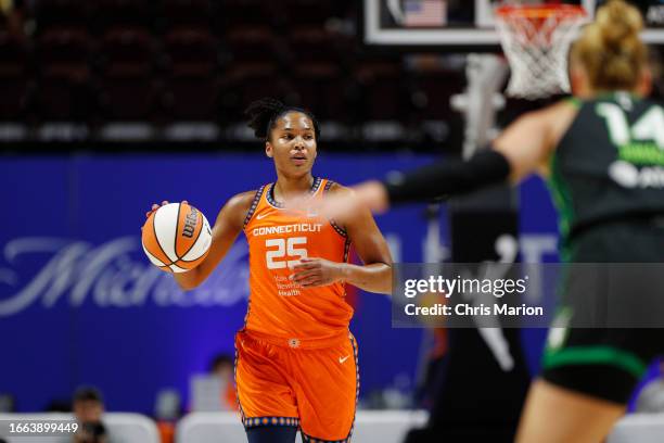 Alyssa Thomas of the Connecticut Sun dribbles the ball during the game against the Minnesota Lynx during round one game one of the 2023 WNBA Playoffs...