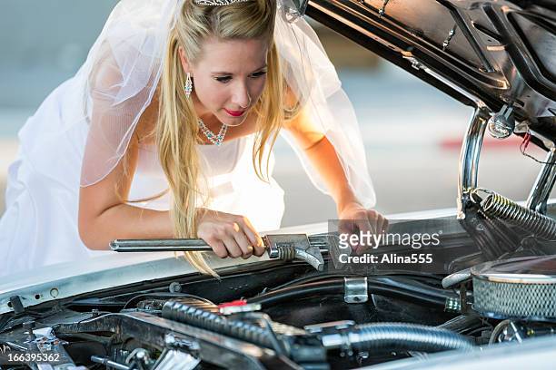 resourceful bride fixing a car - engine failure stock pictures, royalty-free photos & images