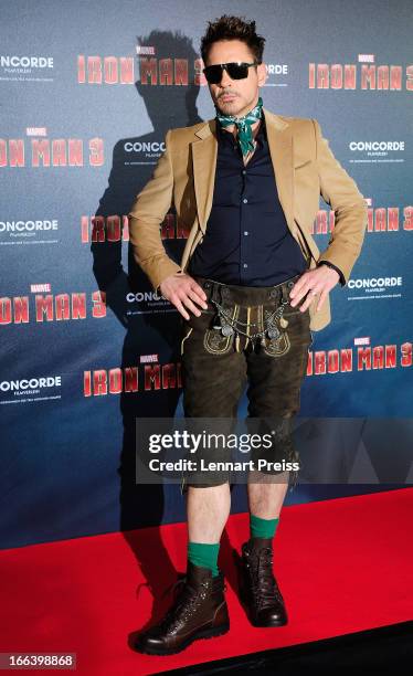 Actor Robert Downey Jr. Poses during the "Iron Man 3" photocall at Hotel Bayerischer Hof on April 12, 2013 in Munich, Germany.