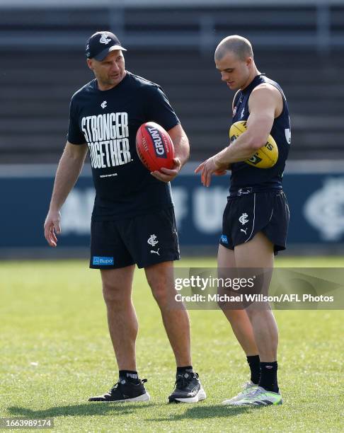 Aaron Hamill and Alex Cincotta of the Blues chat during the Carlton Blues training session at Ikon Park on September 14, 2023 in Melbourne, Australia.