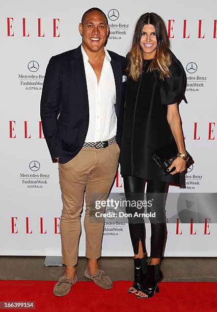 Geoff and Sara Huegill arrive at the Hello Elle Australia show during Mercedes-Benz Fashion Week Australia Spring/Summer 2013/14 at Carriageworks on...