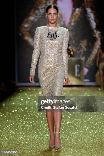 Collette Model A model showcases designs by Collette Dinnigan on the runway at the ...