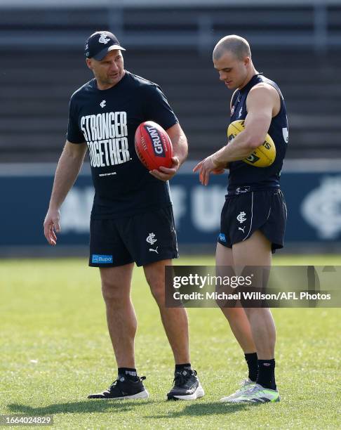 Aaron Hamill and Alex Cincotta of the Blues chat during the Carlton Blues training session at Ikon Park on September 14, 2023 in Melbourne, Australia.