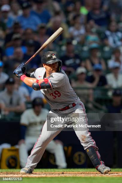 Donovan Solano of the Minnesota Twins bats in the ninth inning against the Milwaukee Brewers at American Family Field on August 23, 2023 in...