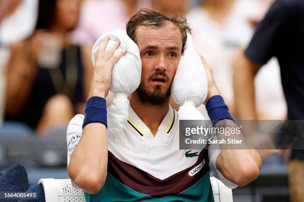 Daniil Medvedev of Russia cools down between games against Andrey Rublev of Russia during their Men's Singles Quarterfinal match on Day Ten of the...