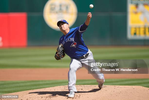 Hyun Jin Ryu of the Toronto Blue Jays pitches against the Oakland Athletics in the bottom of the first inning at RingCentral Coliseum on September...