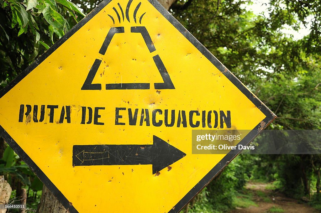 Emergency evacuation sign for volcanic eruption