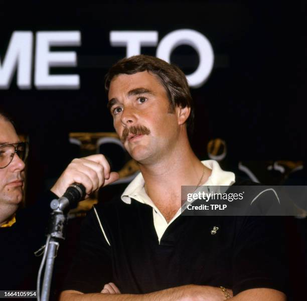 View of British Formula One racing driver Nigel Mansell as he speaks during a press conference at Brands Hatch track, West Kingsdown, England,...