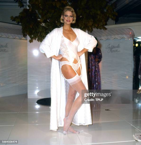 Portrait of fashion model Karen Preston as she poses in lingerie during a fashion show, London, England, March 12, 1986.