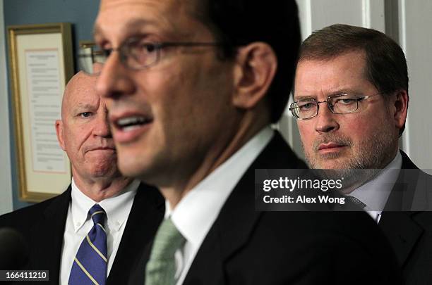 House Majority Leader Rep. Eric Cantor speaks as Grover Norquist , president of Americans for Tax Reform , and U.S. Rep. Kevin Brady listen during a...