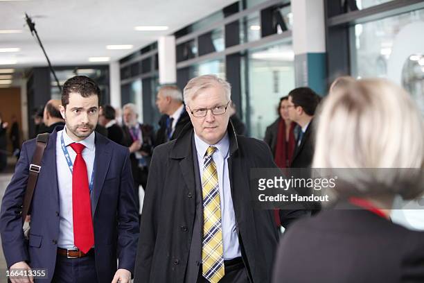 In this handout photo provided by the Dept of the Taoiseach, Olli Rehn, Vice-President of the European Commission arrives at an informal meeting of...