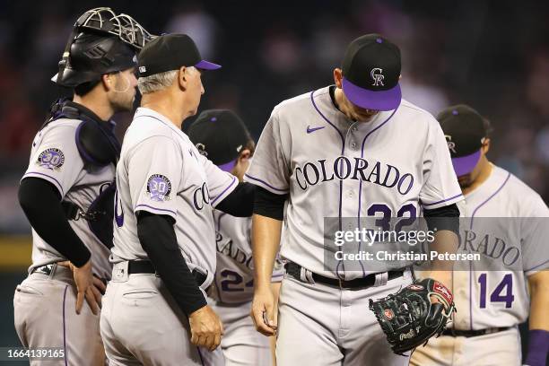 Starting pitcher Chris Flexen of the Colorado Rockies is removed by manager Bud Black during the third inning of the MLB game against the Arizona...