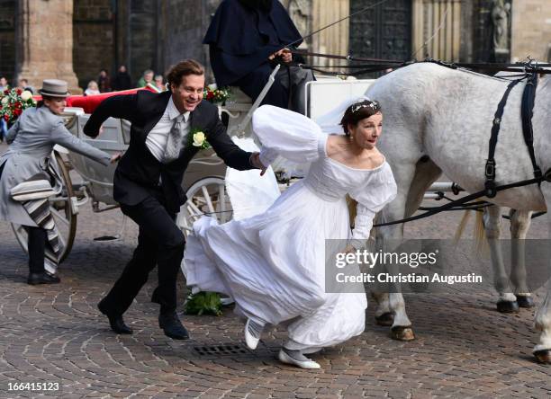 Meret Becker and Thomas Heinze attend the photocall of "Luegen" in front of Bremen townhall on April 12, 2013 in Bremen, Germany.