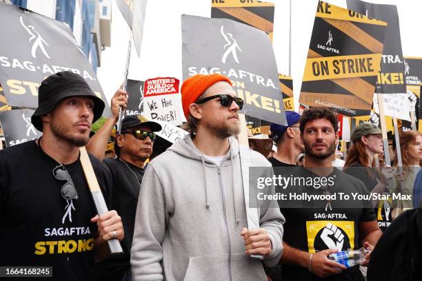 Charlie Hunnam walks in the Netflix to Paramount SAG-AFTRA Solidarity March on September 13, 2023 in Hollywood, California.