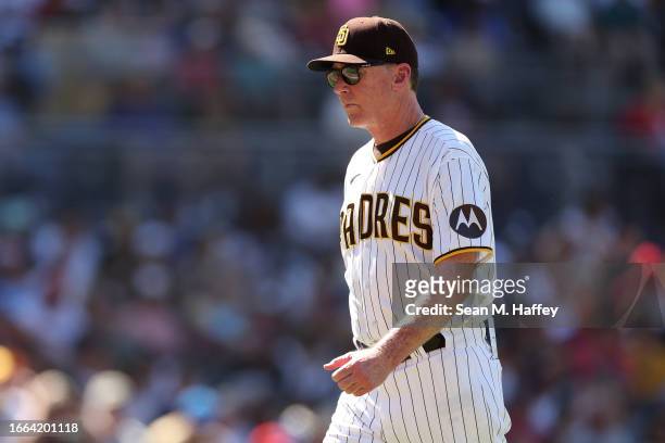 Manager Bob Melvin returns to the dugout after taking Rich Hill of the San Diego Padres out of the game during the fifth inning of a game against the...