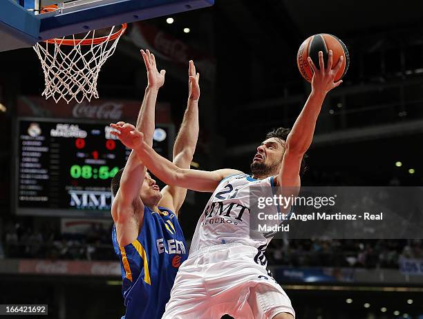 Sergio Llull of Real Madrid goes to the basket against Nik Caner-Medley of Maccabi Electra Tel Aviv during the Turkish Airlines Euroleague Play Off...