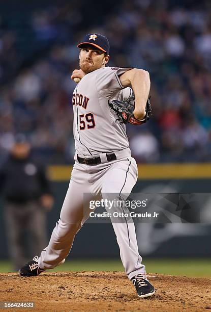 Starting pitcher Philip Humber of the Houston Astros pitches against the Seattle Mariners on Opening Day at Safeco Field on April 8, 2013 in Seattle,...