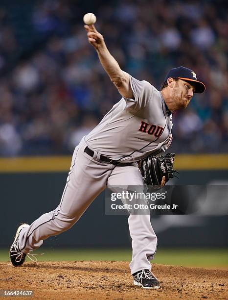 Starting pitcher Philip Humber of the Houston Astros pitches against the Seattle Mariners on Opening Day at Safeco Field on April 8, 2013 in Seattle,...