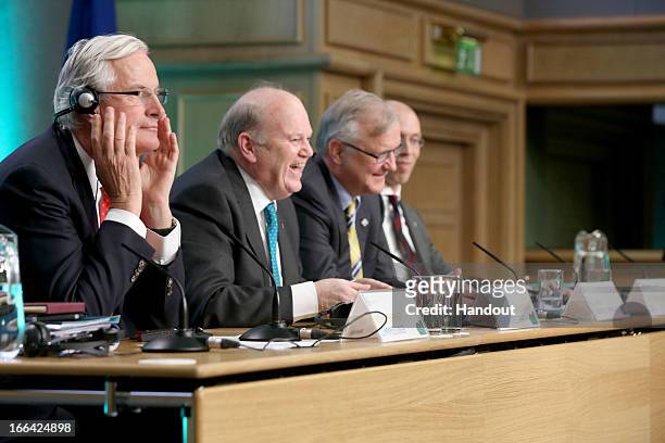 Michel Barnier, Commisioner for Internal Market and Services; Minister for Finance Michael Noonan and Olli Rehn, the European Commision Vice...