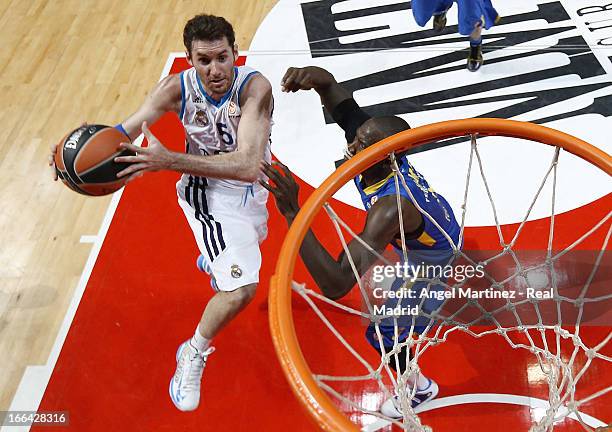 Rudy Fernandez of Real Madrid goes to the basket against Shawn James of Maccabi Electra Tel Aviv during the Turkish Airlines Euroleague Play Off game...