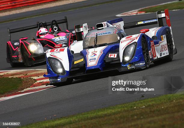 The Toyota Racing Toyota TS030 Hybrid driven by Anthony Davidson of Great Britain, Sebastien Buemi of Switzerland and Stephane Sarrazin of France...