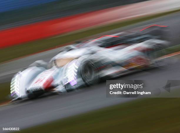 The Audi Sport Team Joest Audi R18 e-tron quattro Hybrid driven by Tom Kristensen of Denmark, Allan McNish of Great Britain and Loic Duval of France...