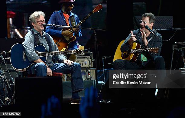 Eric Clapton and Vince Gill perform on stage during the 2013 Crossroads Guitar Festival at Madison Square Garden on April 12, 2013 in New York City.