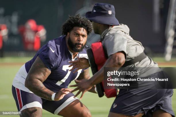 Houston Texans offensive tackle Tytus Howard runs a blocking drill during an NFL training camp Wednesday, July 26 in Houston.