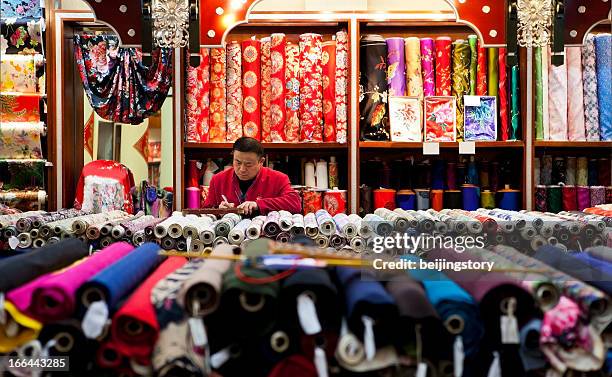 silk shop seller - silk china stock pictures, royalty-free photos & images