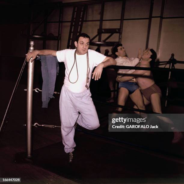 Rendezvous With Lino Ventura: With His Friends Wrestlers And With Family. Lino VENTURA dans une salle de sport à PARIS avec ses amis catcheurs : le...