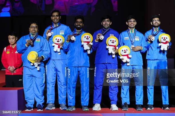 Bronze medalists Desai Harmeet, Shah Manush Utpalbhai, Gnanasekaran Sathiyan, Thakkar Manav Vikash, Achanta Sharath Kamal of Team India pose for a...