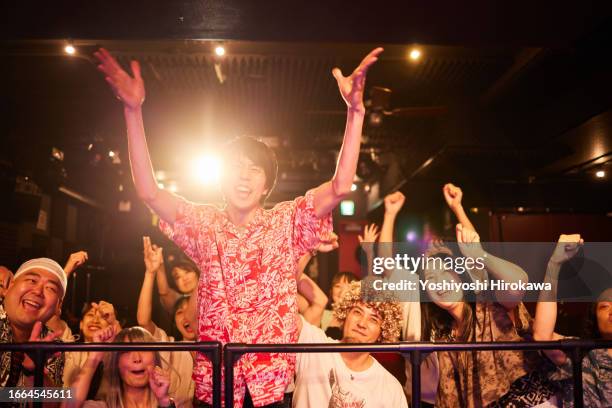 audience at concert hall. - gelovige stockfoto's en -beelden