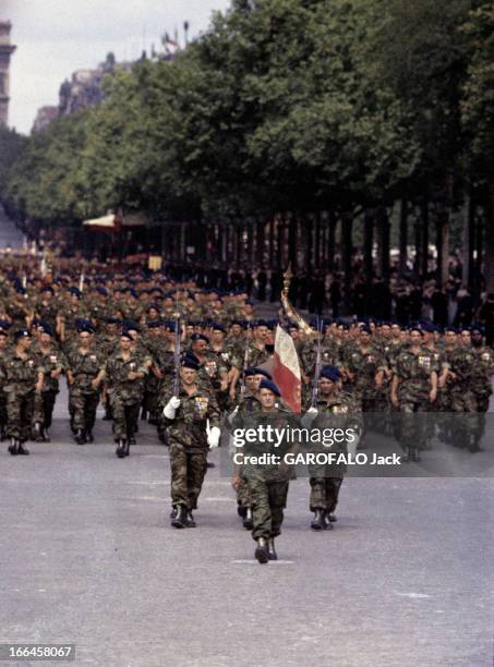 The Military Parade Of July 14Th, 1989. France- Paris- période 1956-1958- Le défilé du 14 juillet sur l'avenue des Champs Elysées. Le 8e Régiment de...