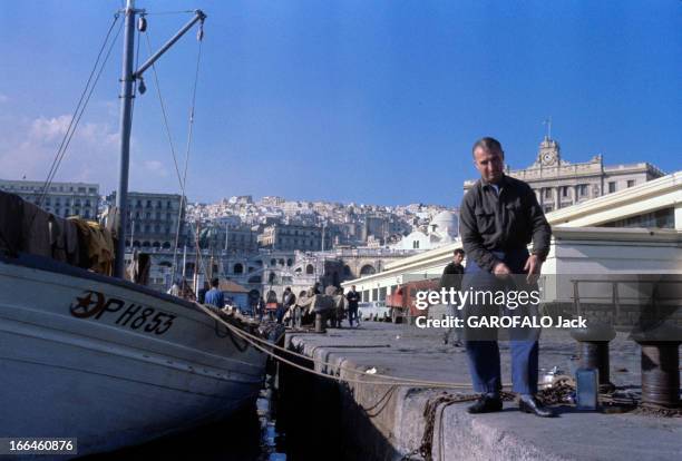 Algiers, Bab El Wadi In 1963. Bab El Oued, faubourg d'Alger- automne 1962- Un français resté ici pose sur la jetée du port de pêche d'Alger.