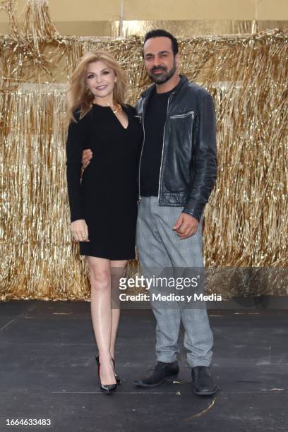 Itatí Cantoral and Ariel Miramontes pose for photos during the first day of filming of the movie 'Desastre en Familia' At Barco Utopia on September...