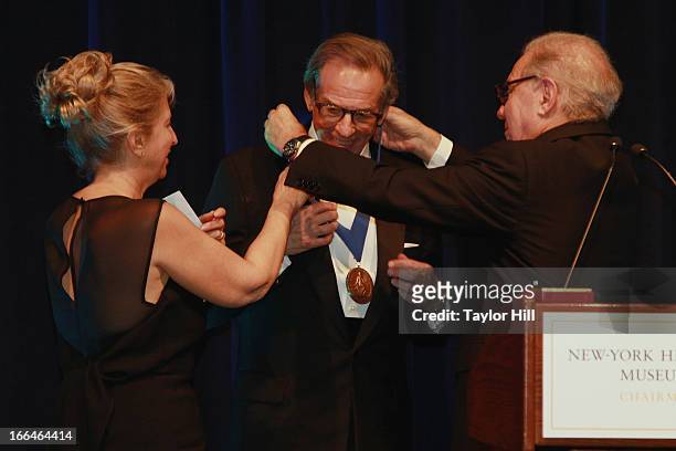 New-York Historical Society Chairman and CEO Louise Mirrer and Chairman of the Board of Trustees Roger Hertog present biographer Robert A. Caro with...