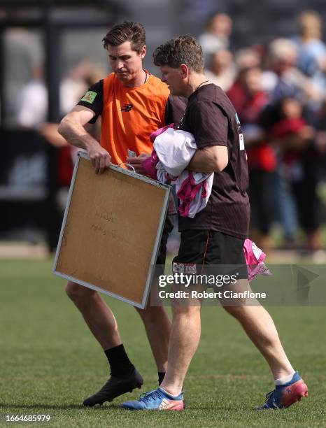 Saints assistant coaches Lenny Hayes and Robert Harvey are seen during a St Kilda Saints AFL training session at RSEA Park on September 07, 2023 in...