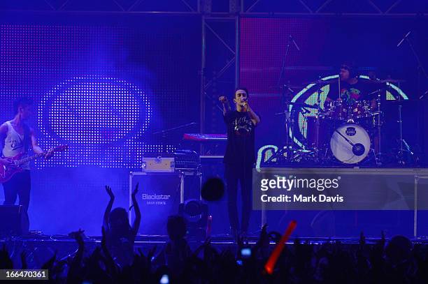 Nick Tsang, Matthew Curtis and Josh Friend of Modestep perform onstage during day 1 of the 2013 Coachella Valley Music & Arts Festival at the Empire...