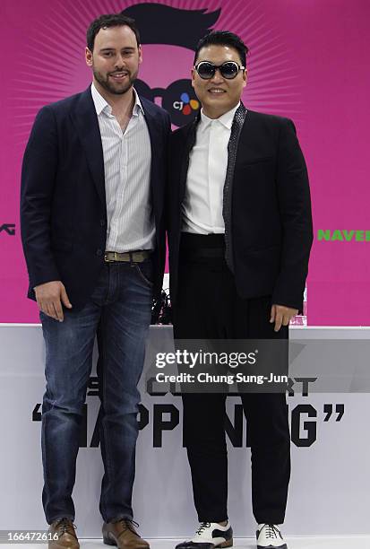 Singer PSY and manager Scooter Braun attend a press conference before his concert to introduce his new single 'Gentleman' at Olympic Stadium on April...